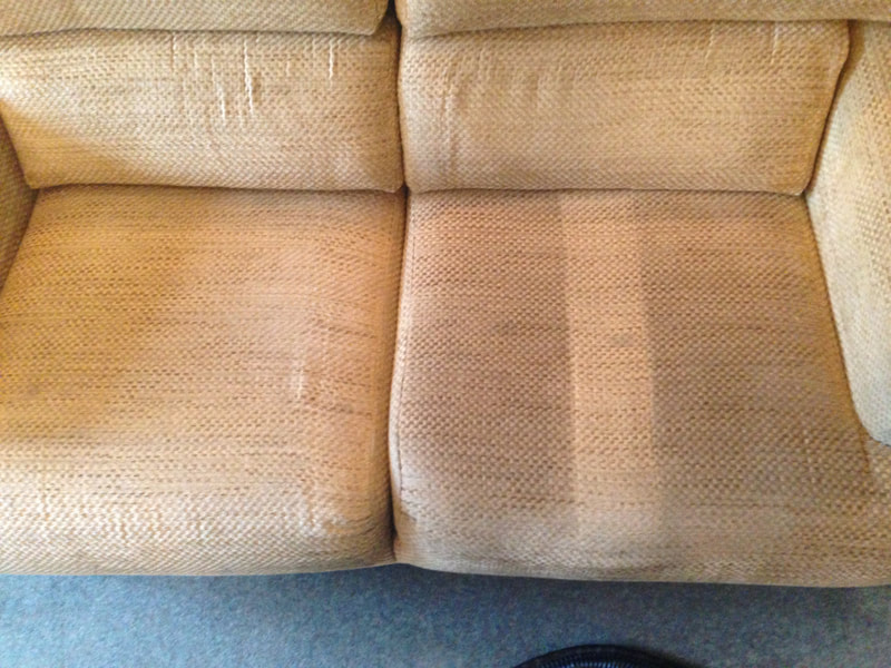 A sofa upholstery cleaning in progress